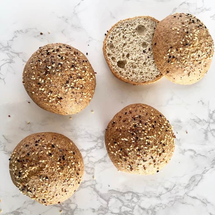 Four keto buns on a marble counter top