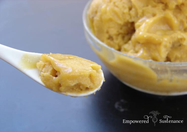 A close up of pumpkin ice cream on a spoon