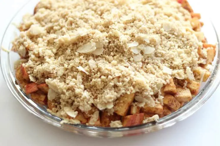 A close up of a Paleo Apple Crisp in a glass dish