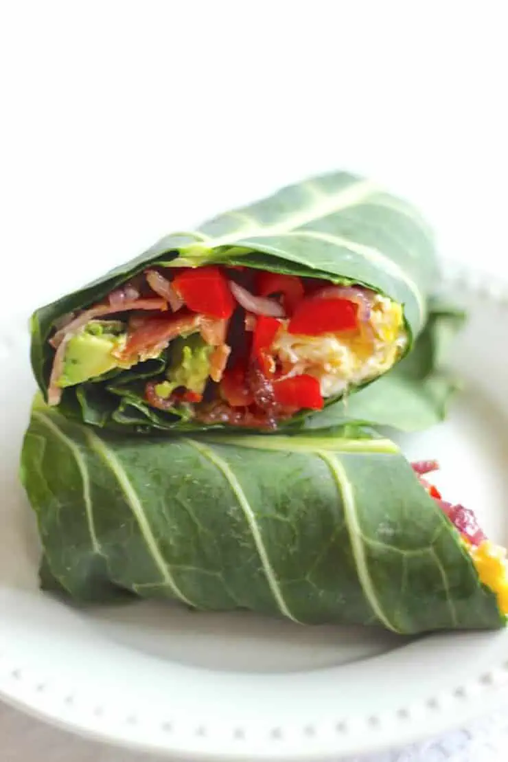 A healthy breakfast burrito cut in half