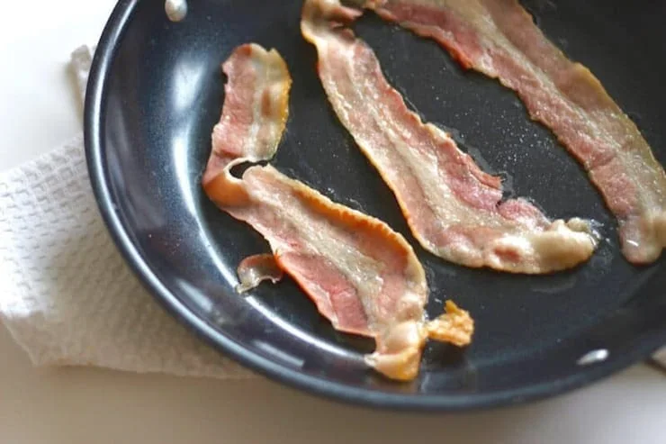 Bacon in a frying pan