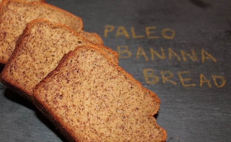 three slices of banana bread on black granite