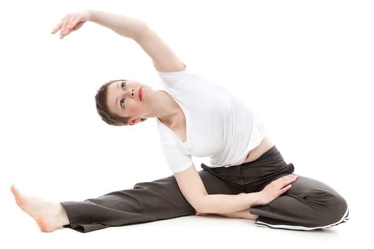 Woman in exercise clothing stretching