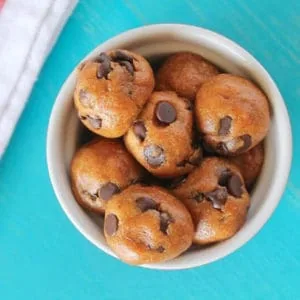 An overhead shot energy balls in a white ramekin