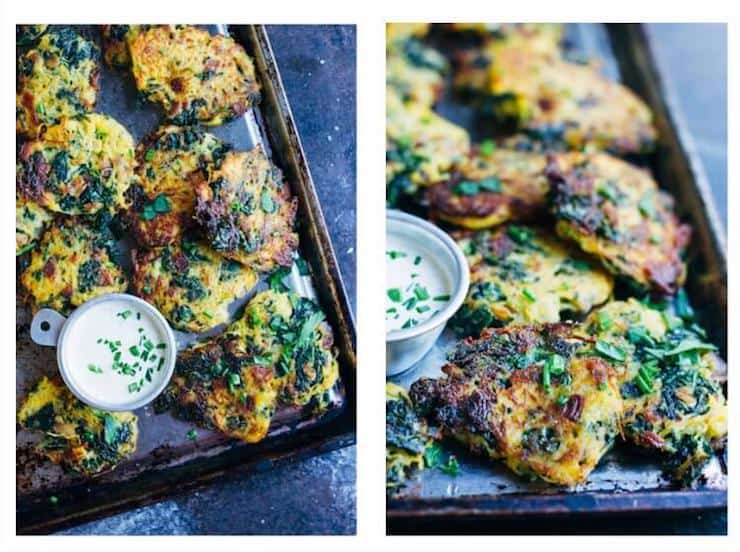 Bacon and kale fritters on metal baking sheet with small cup of sauce