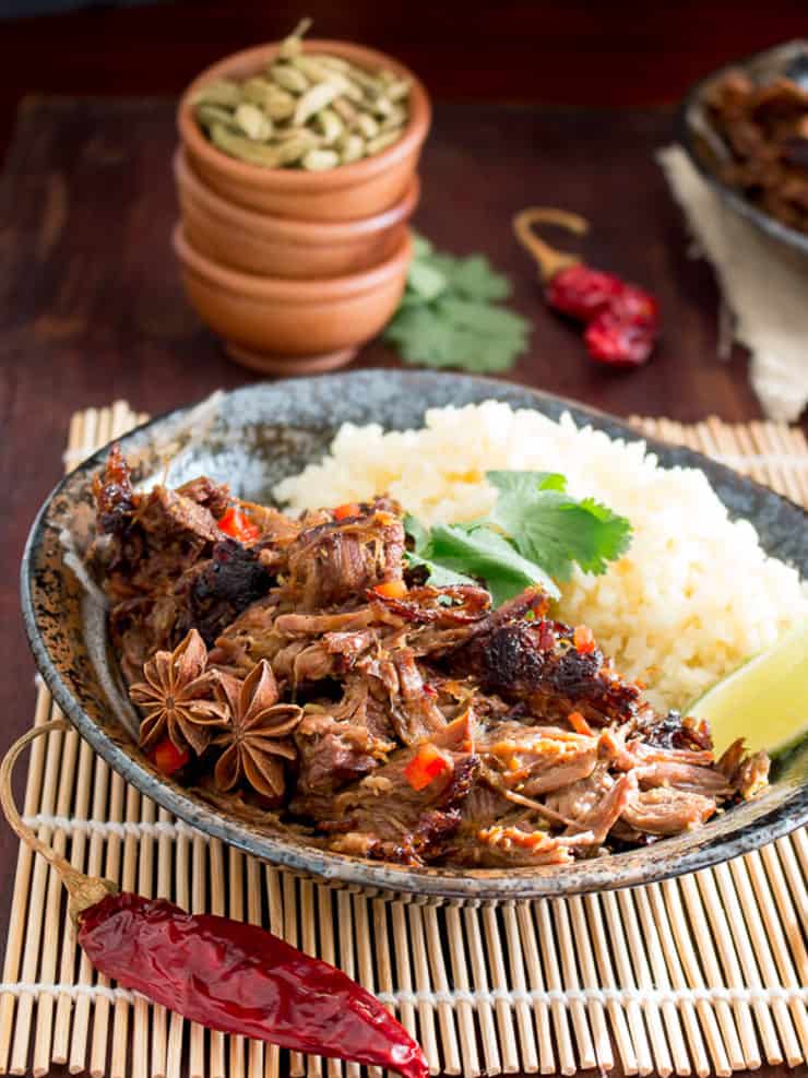 Slow cooker beef in a bowl with rice