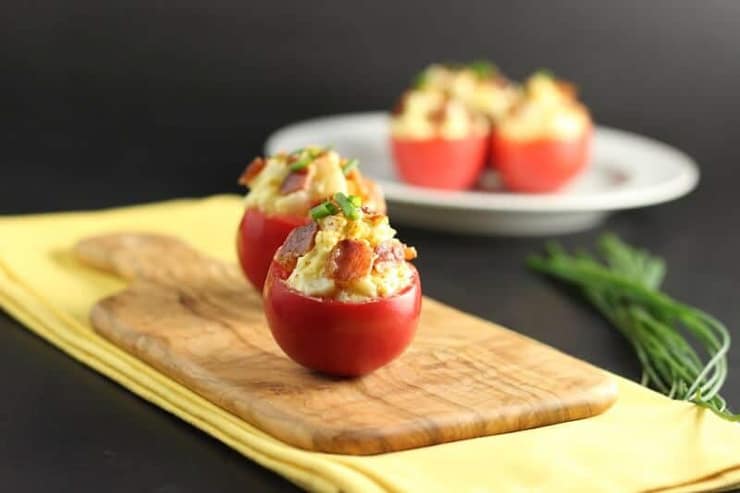 Cherry tomato appetizers on a wooden board