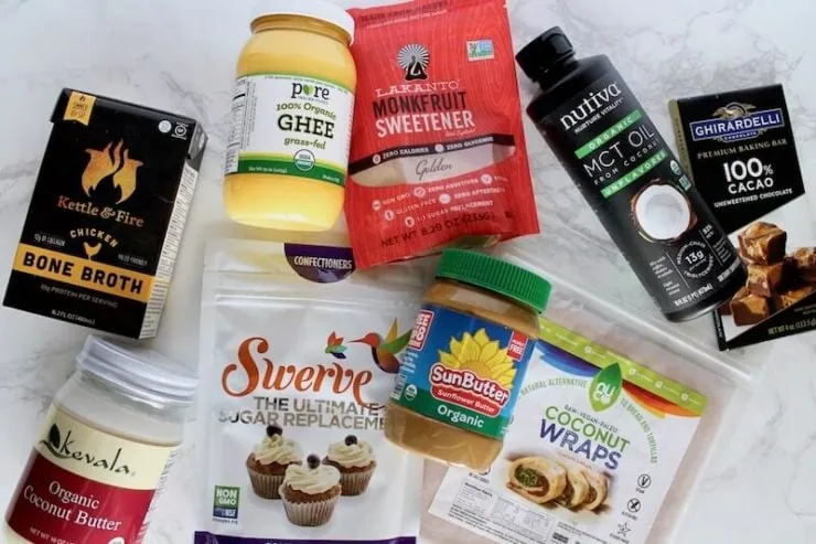 Packaged ingredients used to make crepes on white marble counter