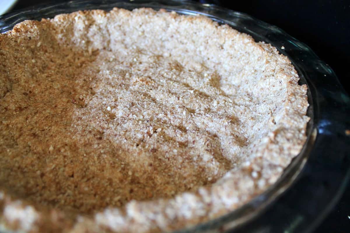 Baked pie crust on black surface