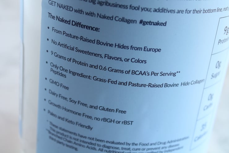 Close up of health benefits of naked collagen printed on blue tub