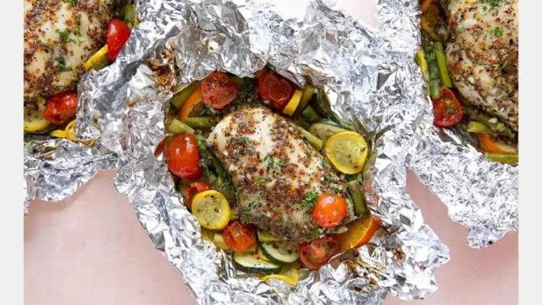 chicken and vegetables in a foil packet