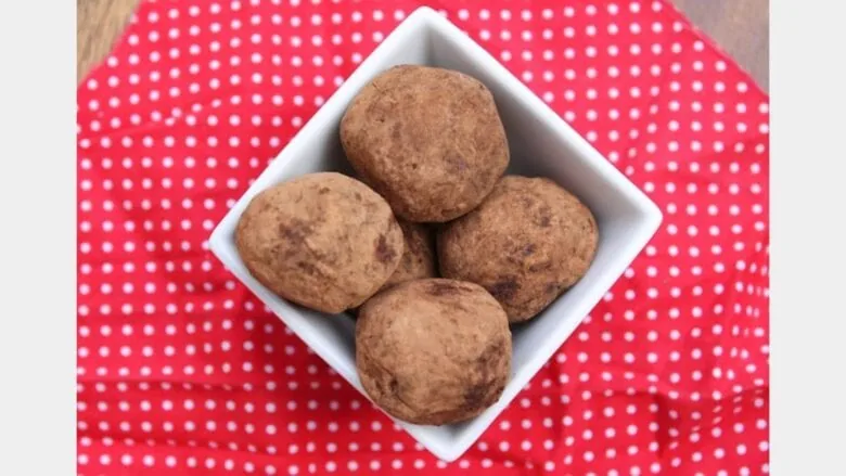 overhead shot of fudge balls in a white bowl