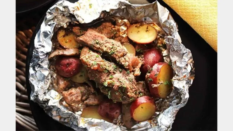 foil packet filled with steak and potatoes