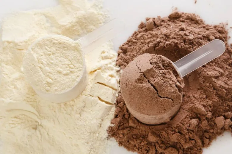 Scoops of chocolate and vanilla protein powder.