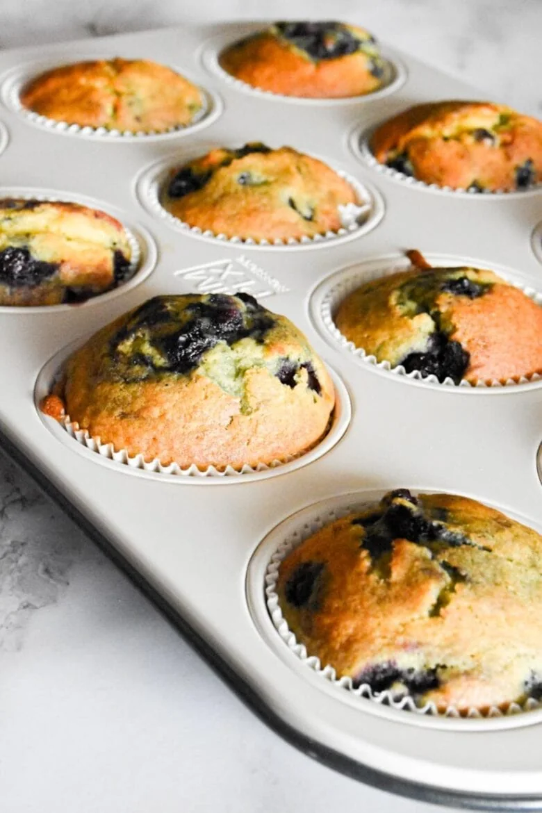 A delicious recipe for blueberry muffins made with a convenient blueberry muffin cake mix. Prepare these mouthwatering treats in a muffin tin for a perfectly portioned and irresistible treat